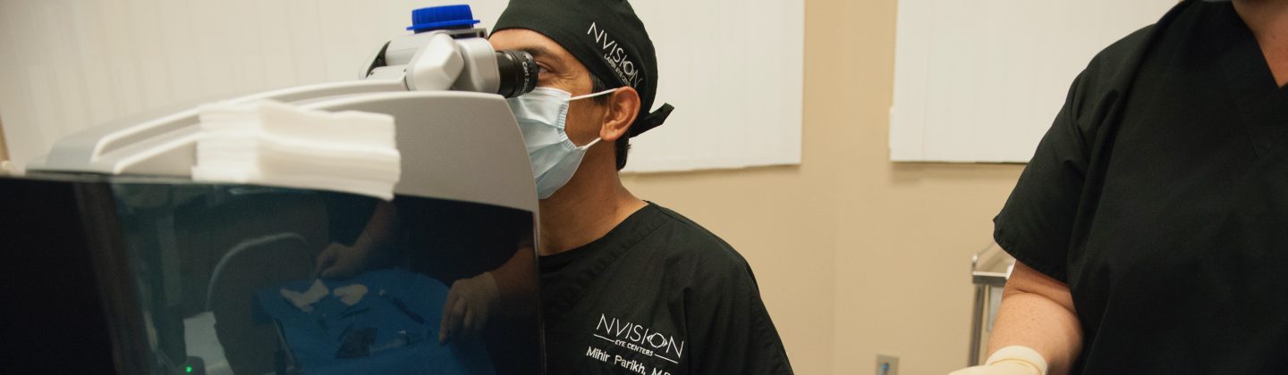 Ophthalmologist reviewing materials with patient