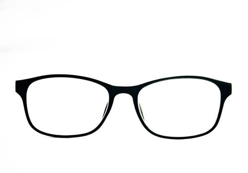 https://www.nvisioncenters.com/wp-content/uploads/black-frame-glasses-close-up.jpg