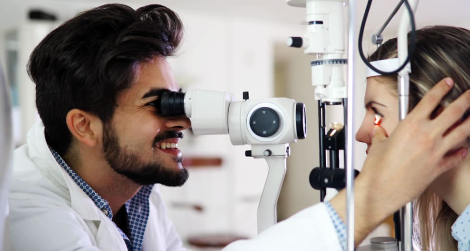 eye doctor doing an exam