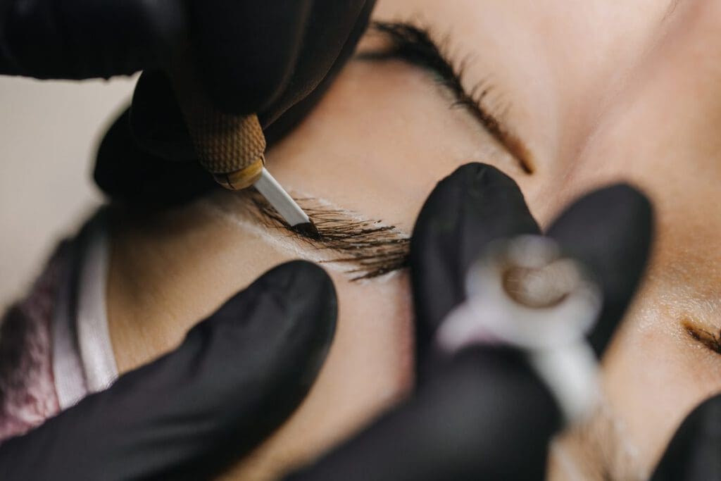 woman getting microblade eyebrows