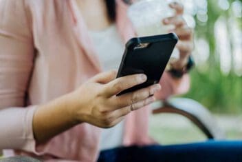 woman texting on phone