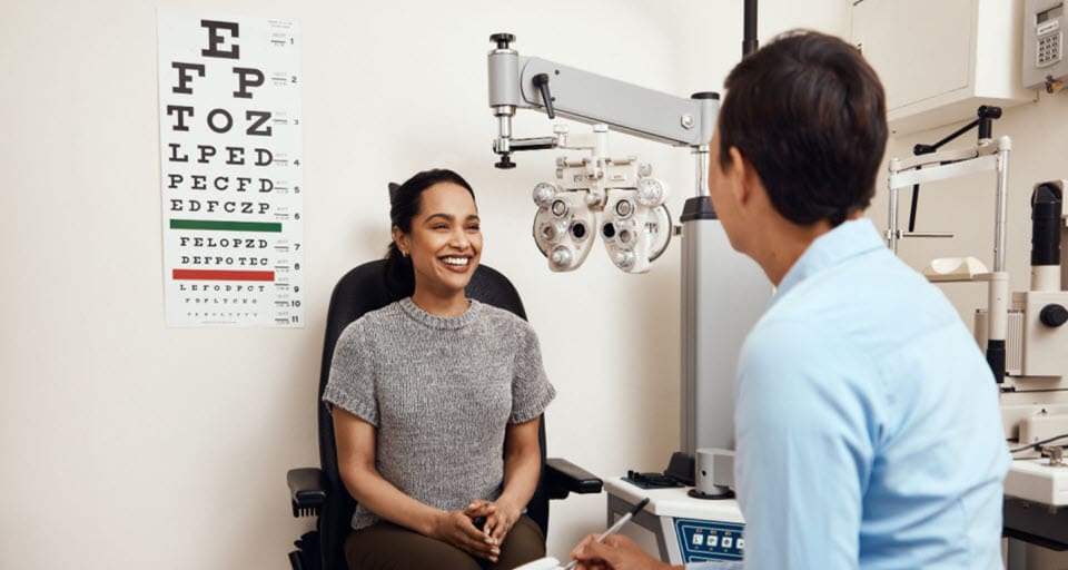 woman with eye doctor